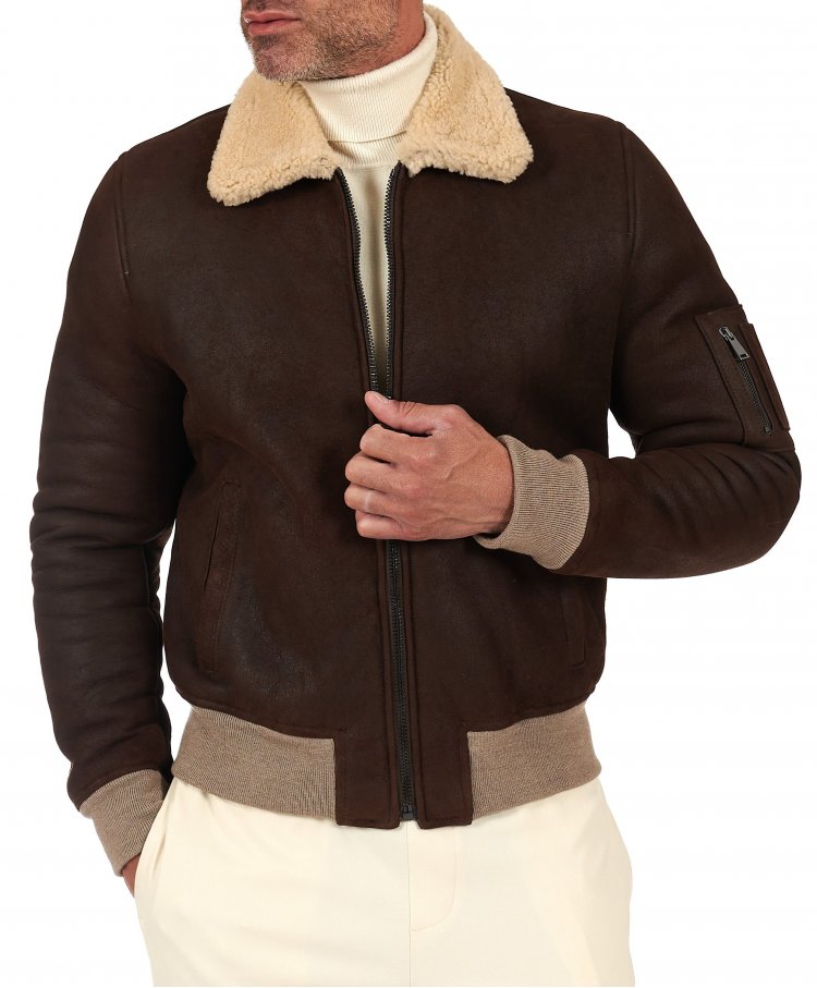 Dark brown shearling bomber...